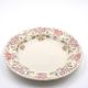 Antique Longchamp service shallow dish with polychrome daisies, ironstone, 19th century.