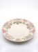Plat creux de service ancien Longchamp Pâquerettes en terre de fer polychrome, XIXe