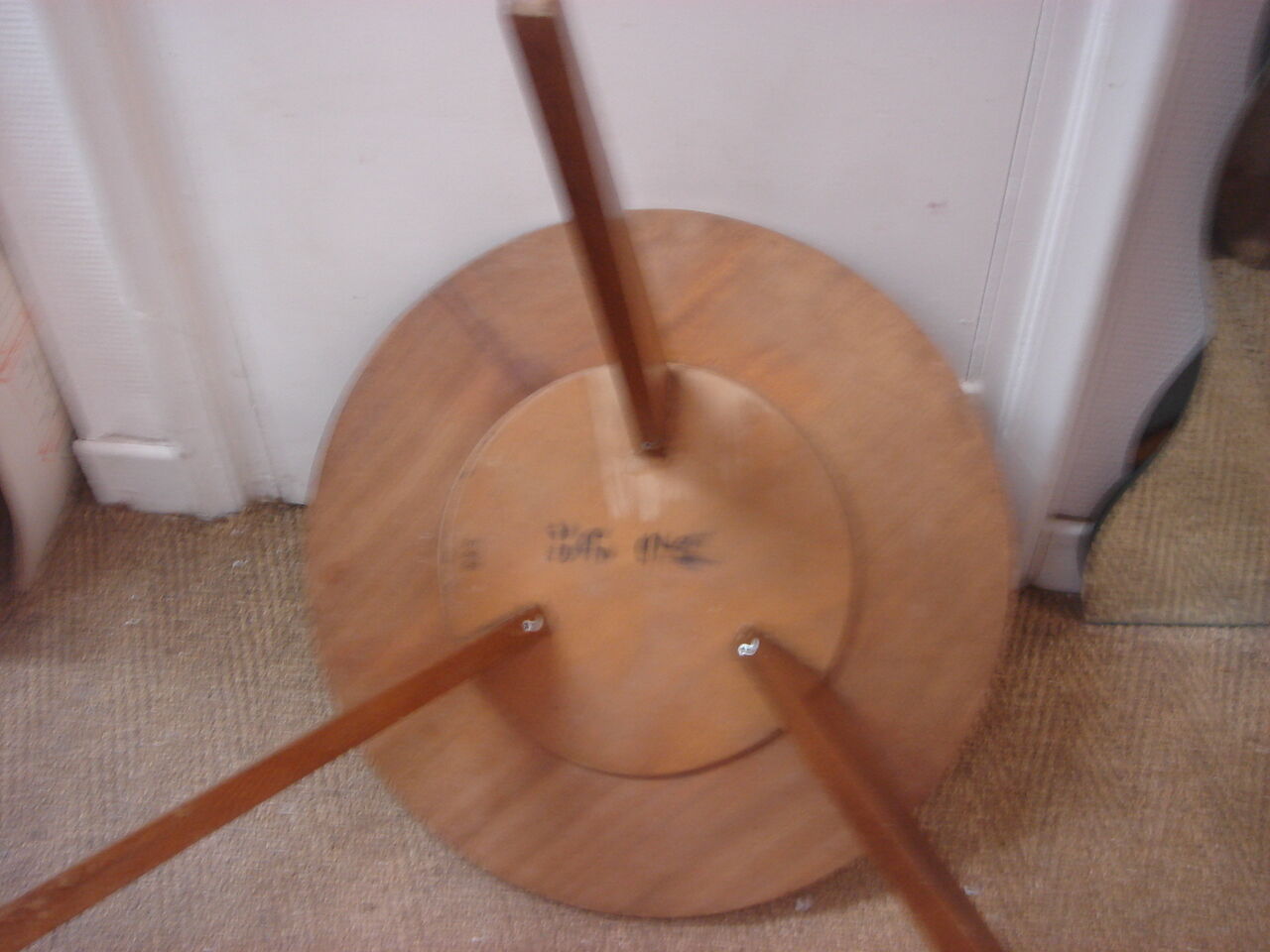 Round table in light oak with scandinavian tripod foot of 1960