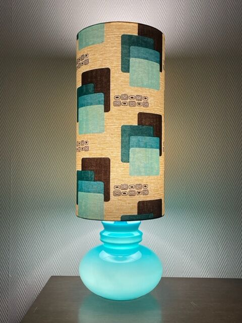 Blue opaline table lamp and vintage Maori fabric