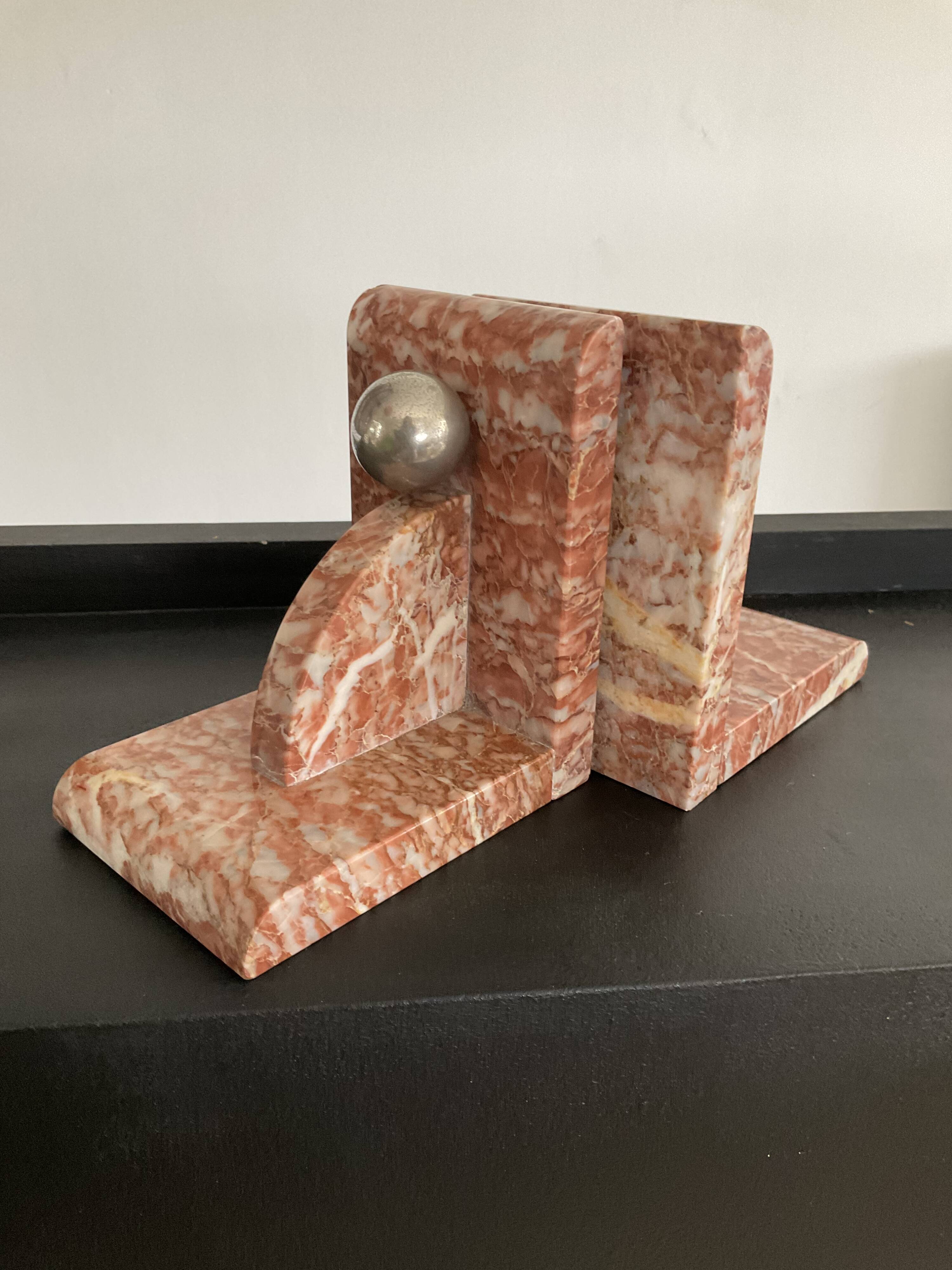Pair of art deco series-books in marble and brass