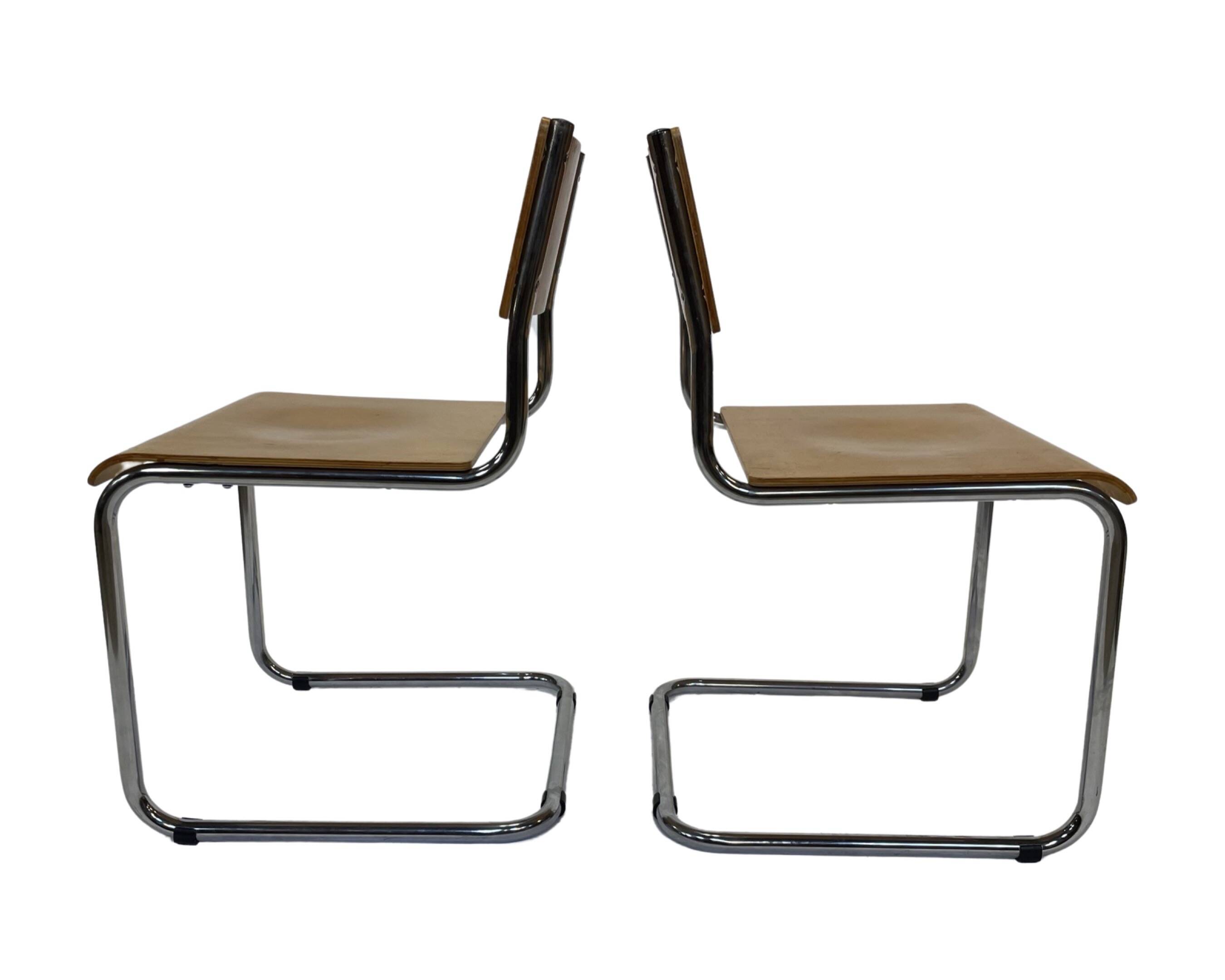 Set of four vintage dining room chairs, wood and chrome,  1970s