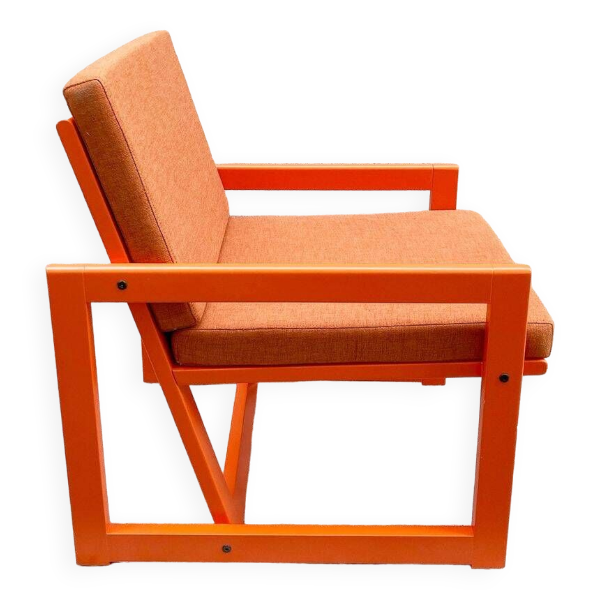 Orange designer armchair by Terence Conran