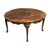 Coffee table in magnifying glass to drown 50 years