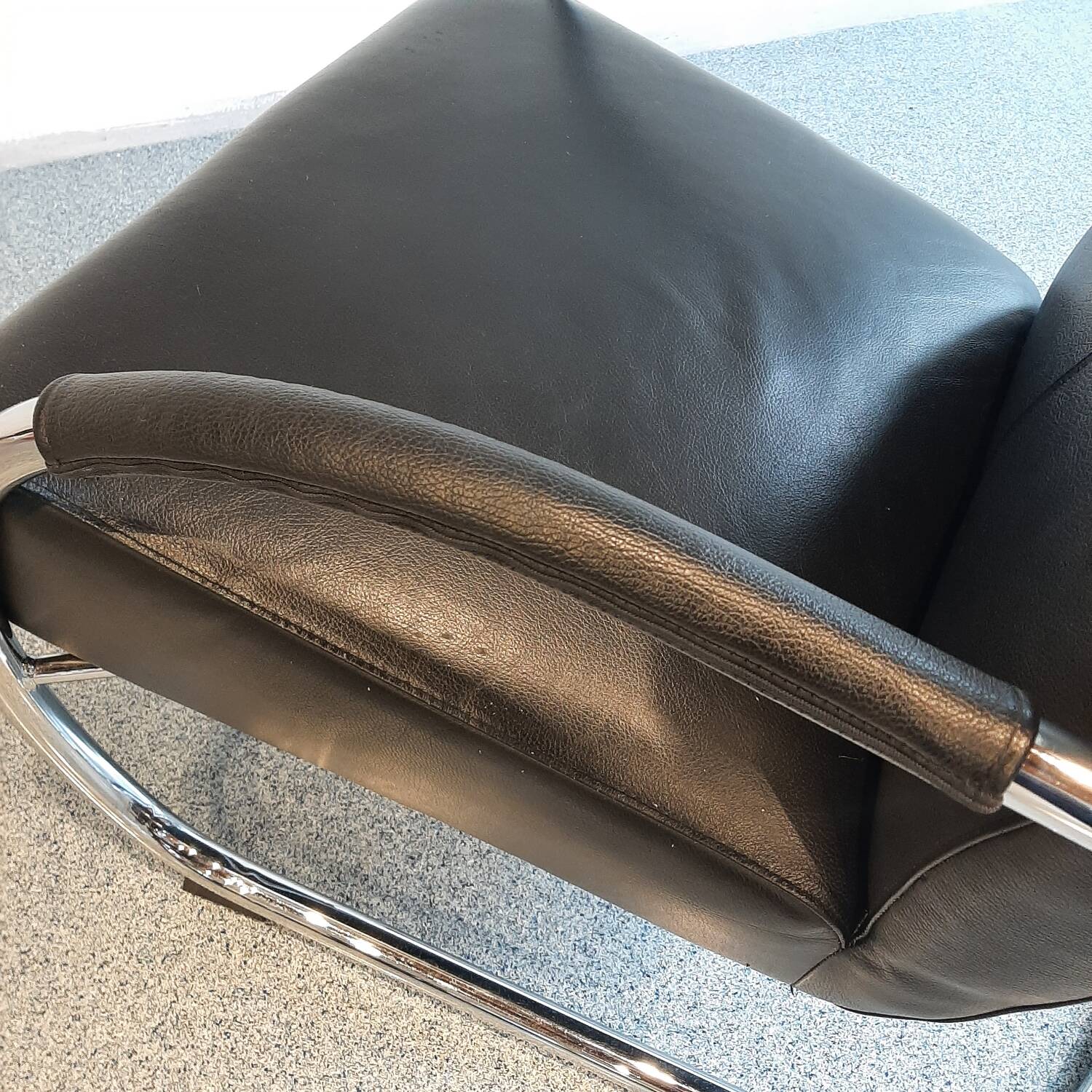 Pair of tubular armchairs