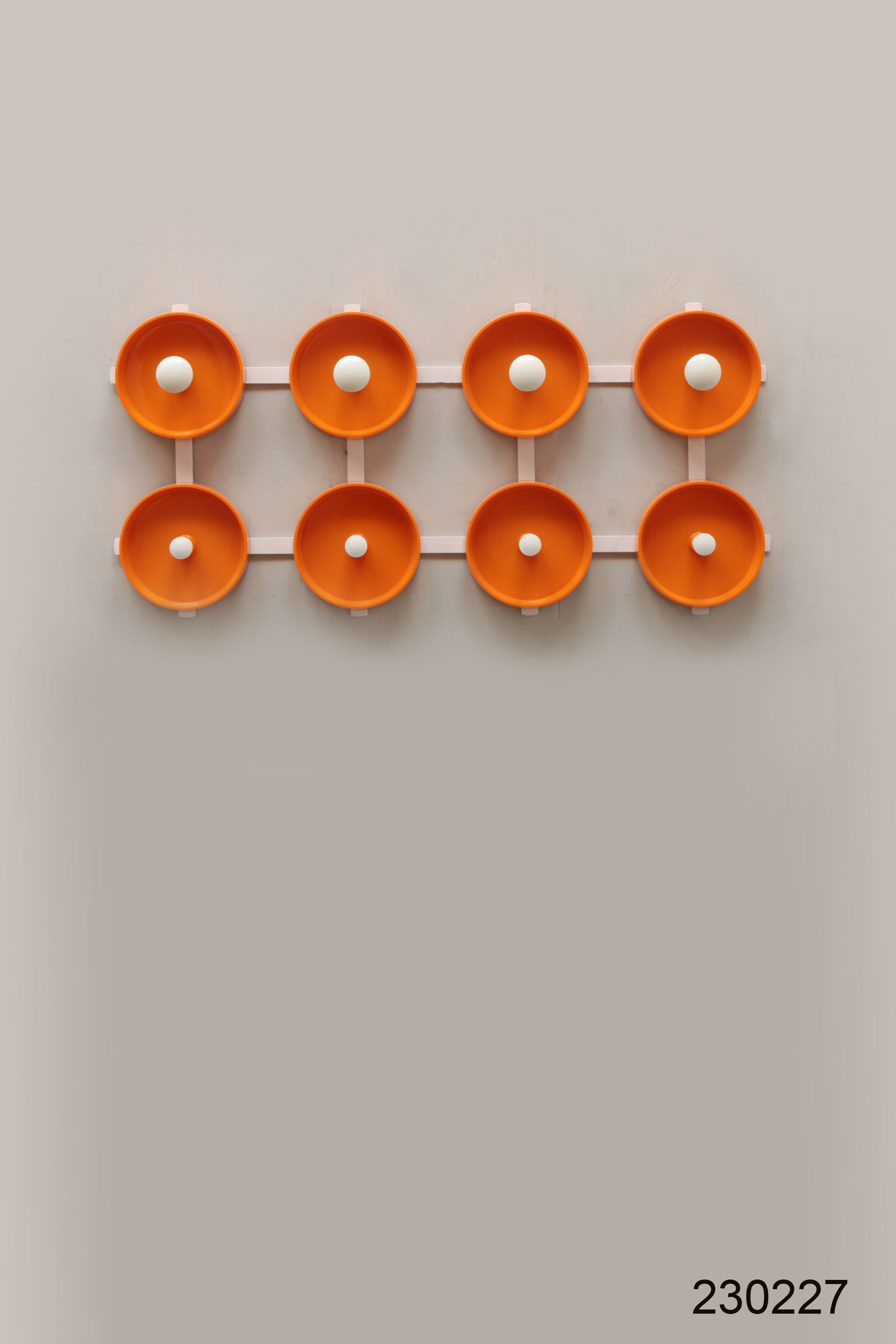Orange spage age wall coat rack 1960s