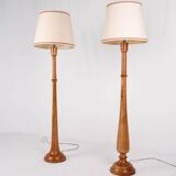 Pair of turned wooden floor lamps in Art Deco style, France, mid-20th century.