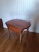 Round folding table in solid wood