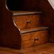 Antique English oak secretary with drop-down front.