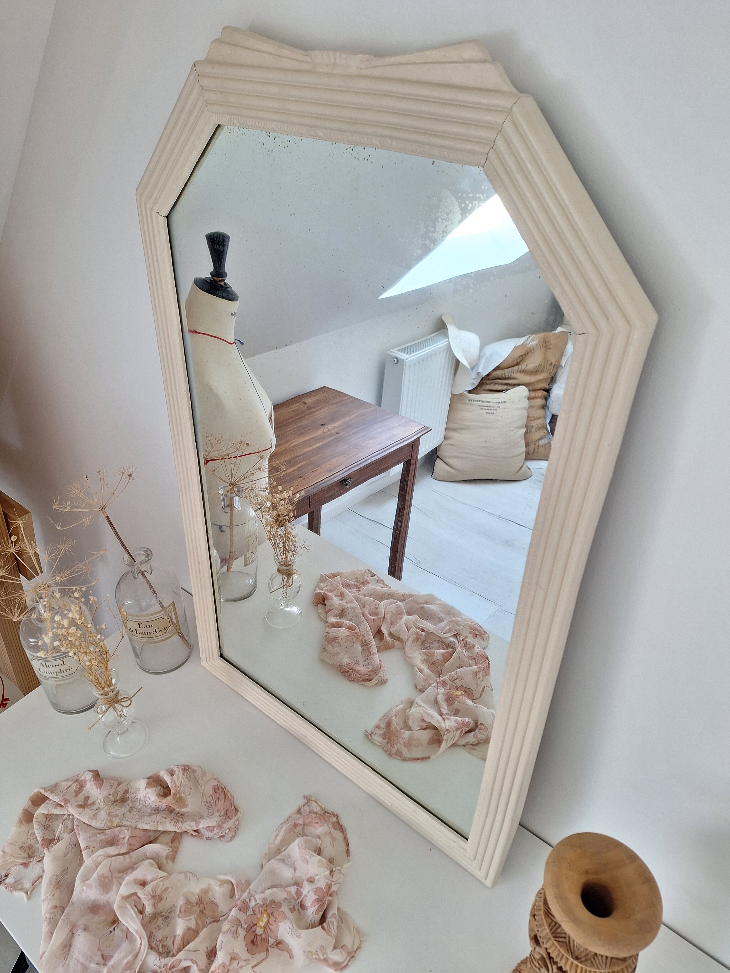 Beige bevelled and moulded mirror