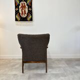 Danish teak & curly armchair