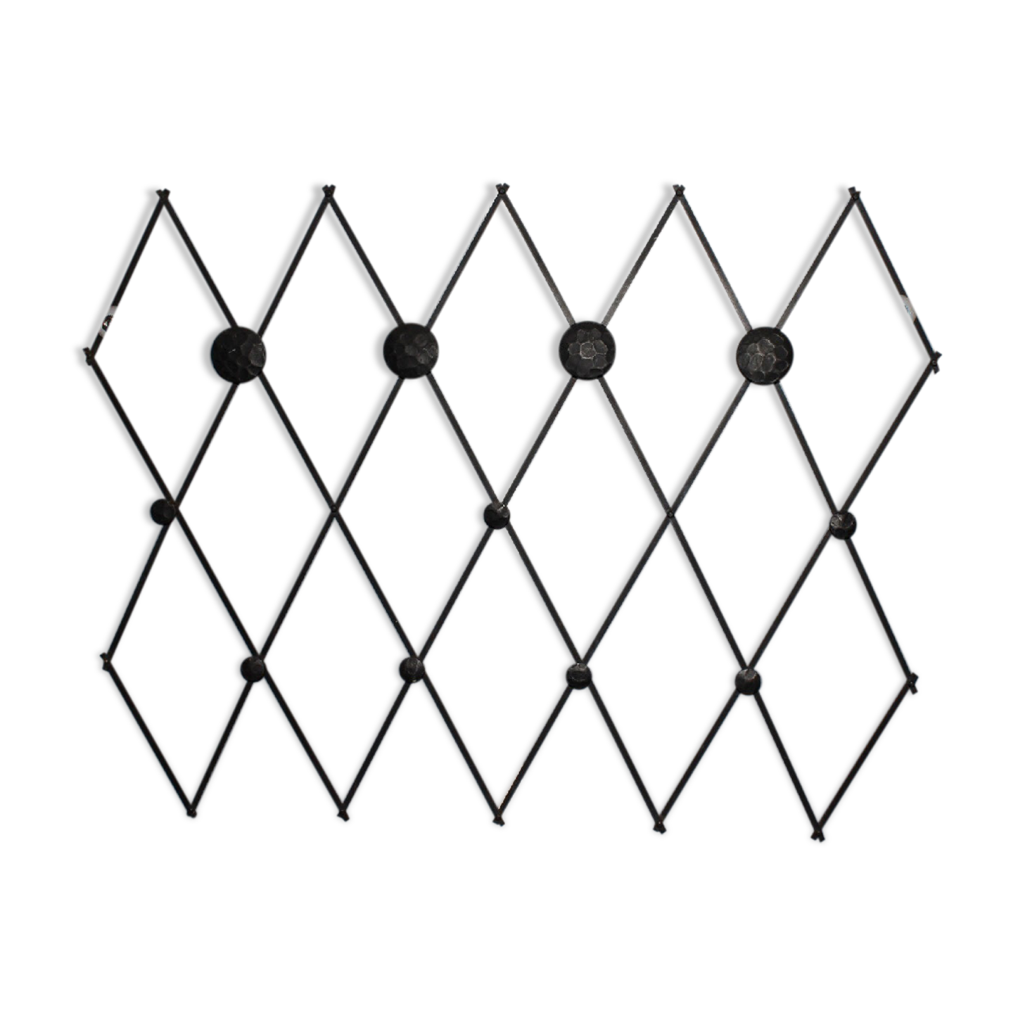 Patere wears vintage iron forge coat