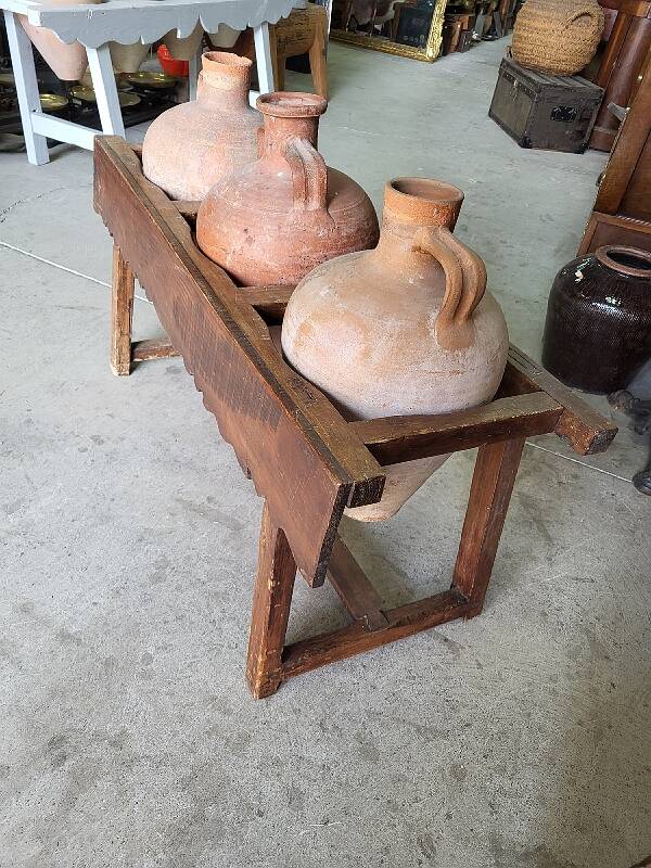 Old wooden jar holder with 3 clay jars