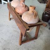 Old wooden jar holder with 3 clay jars