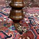 Victorian-style mahogany English table with 3 extensions.