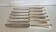 Set of 6 Christofle table knives, stainless steel blade and silver handle.