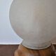 White glass globe table lamp with geometric reliefs