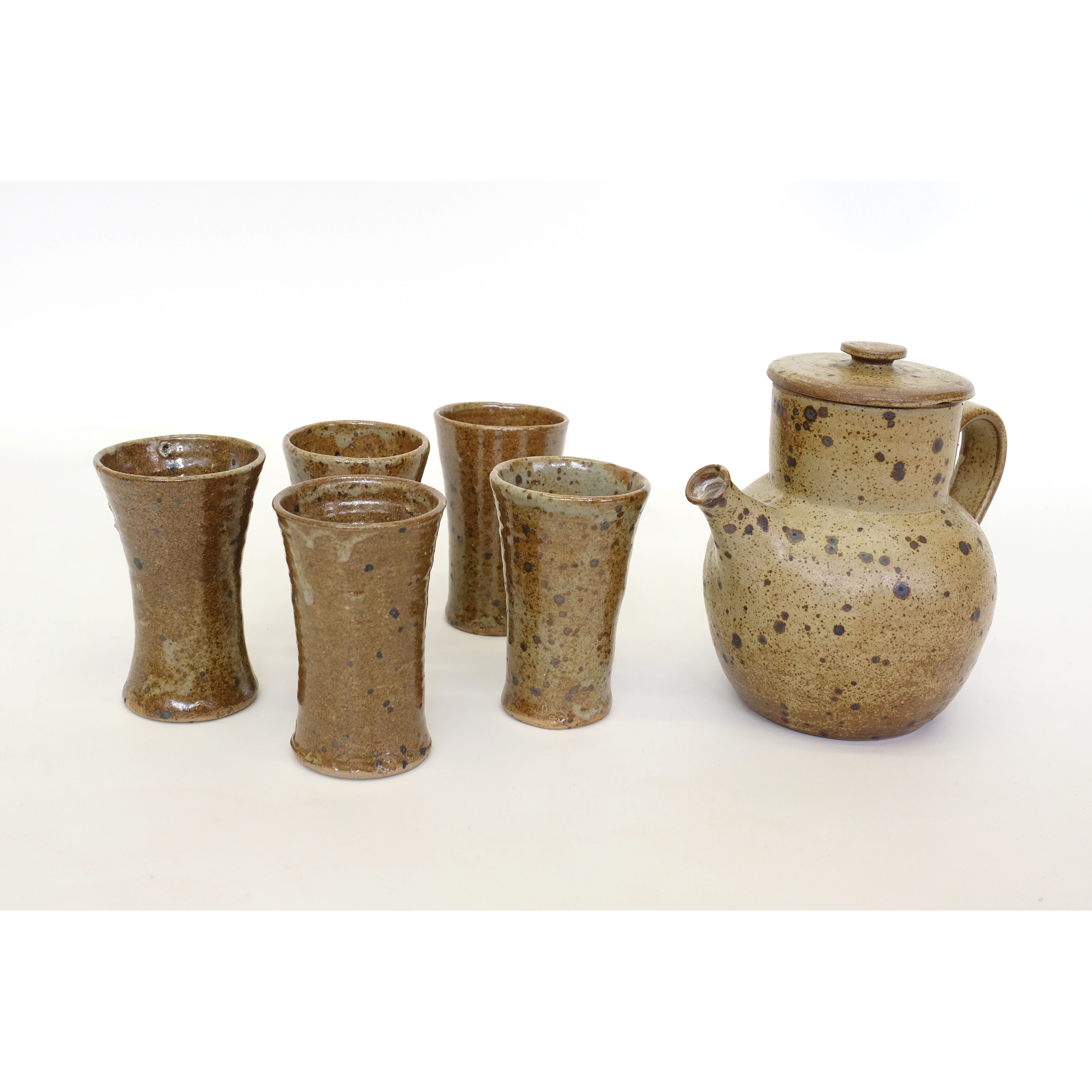 Sandstone teapot from La Borne and 5 cups signed Tiffoche, 1970s.