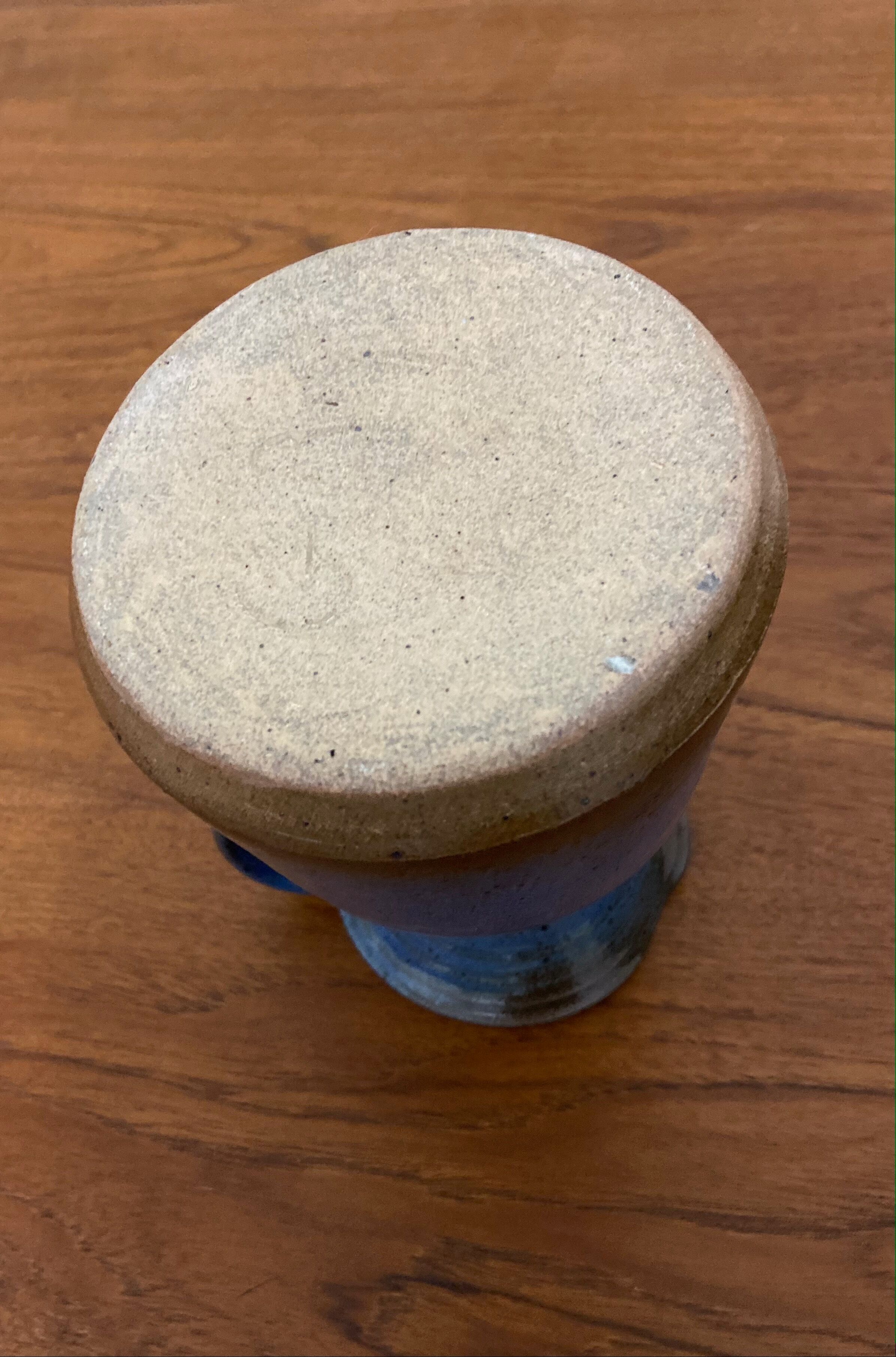 Glazed stoneware pitcher