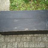 Old chest or wooden trunk black patina