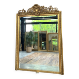 Pedimented mirror 184.5cm/135cm gilded with gold leaf