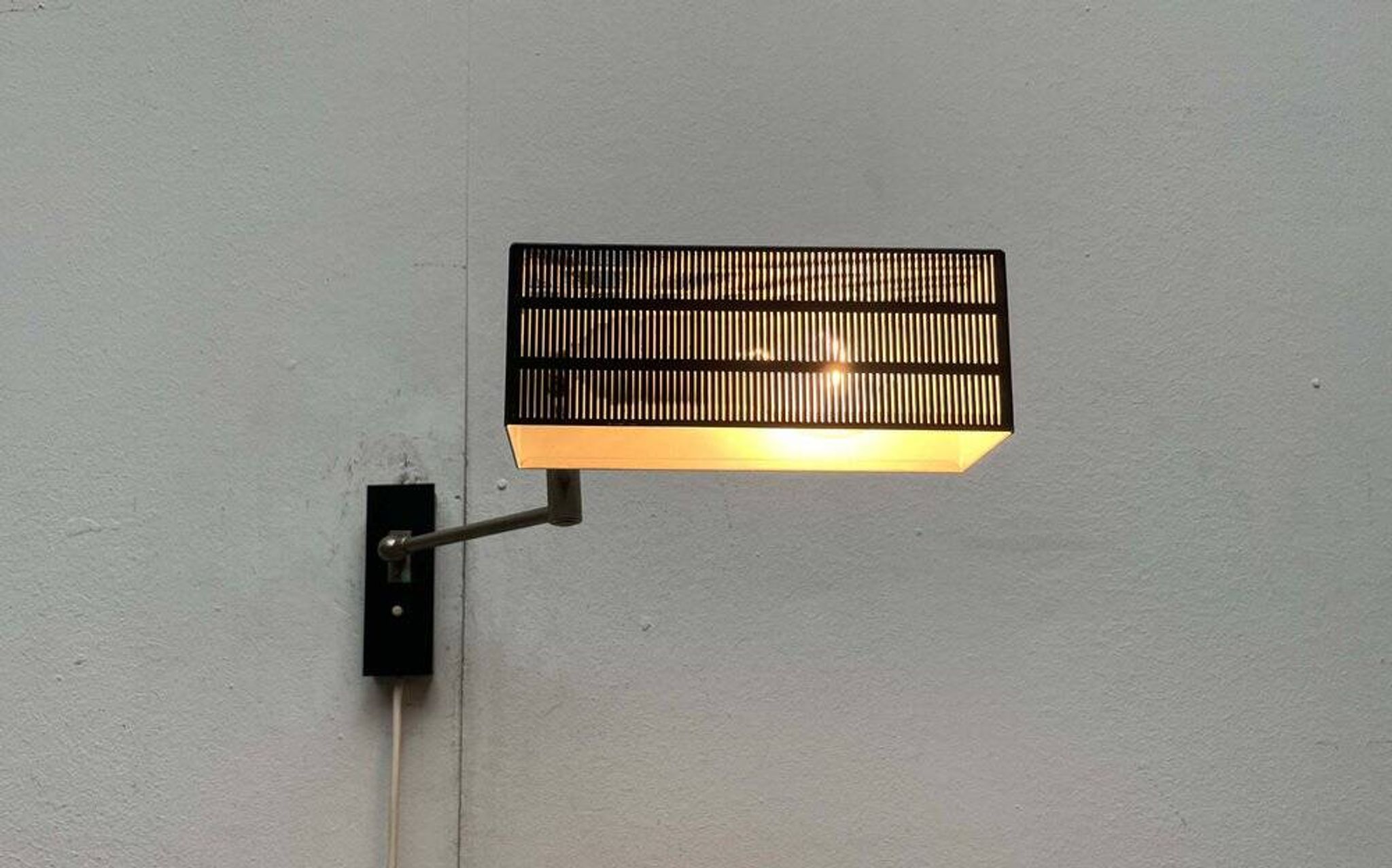 Mid-century German minimalist wall lamp model Flamingo by BUR, Bünte & Remmler Leuchten, 1960s.