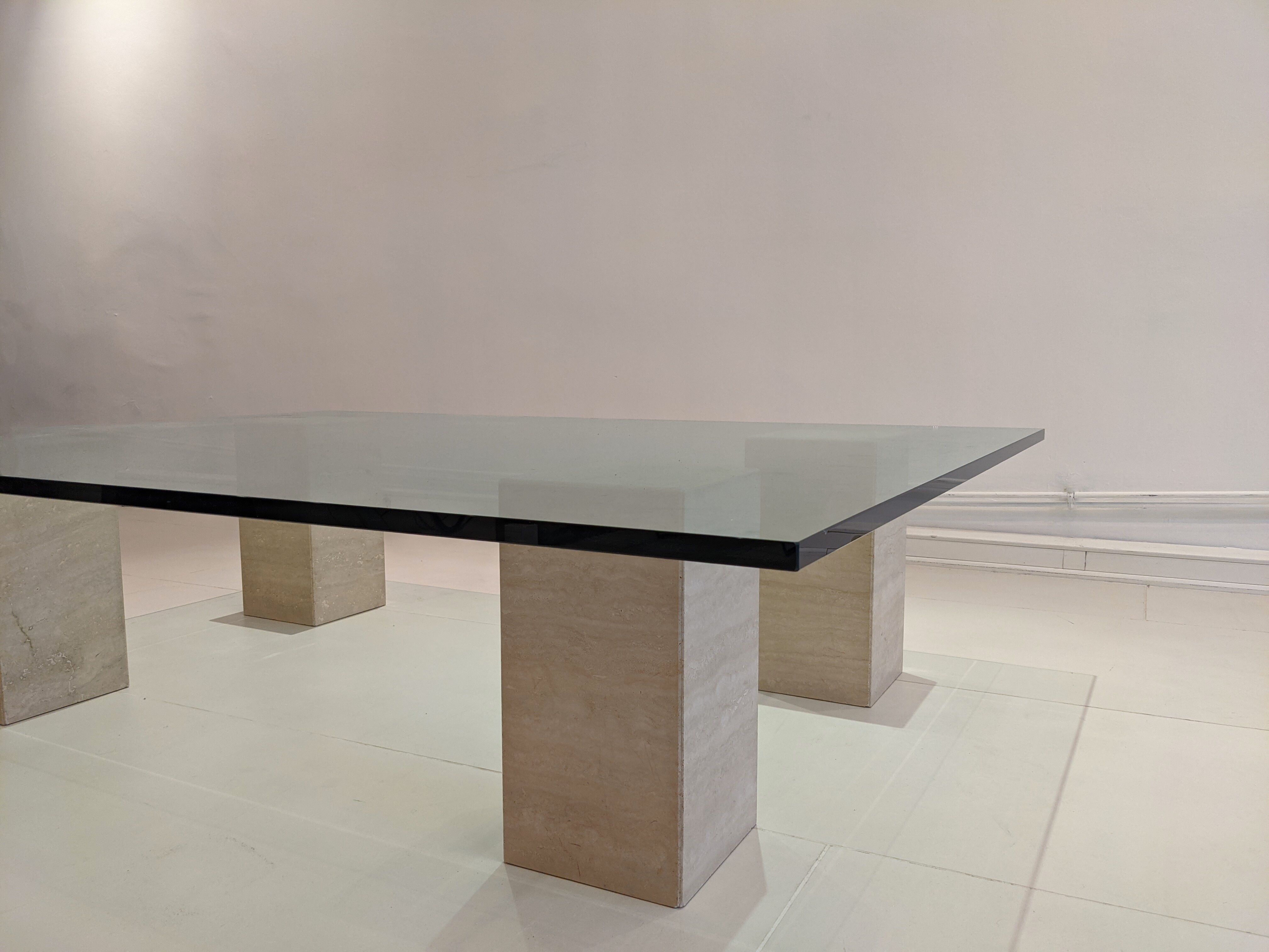 Glass table and travertine feet