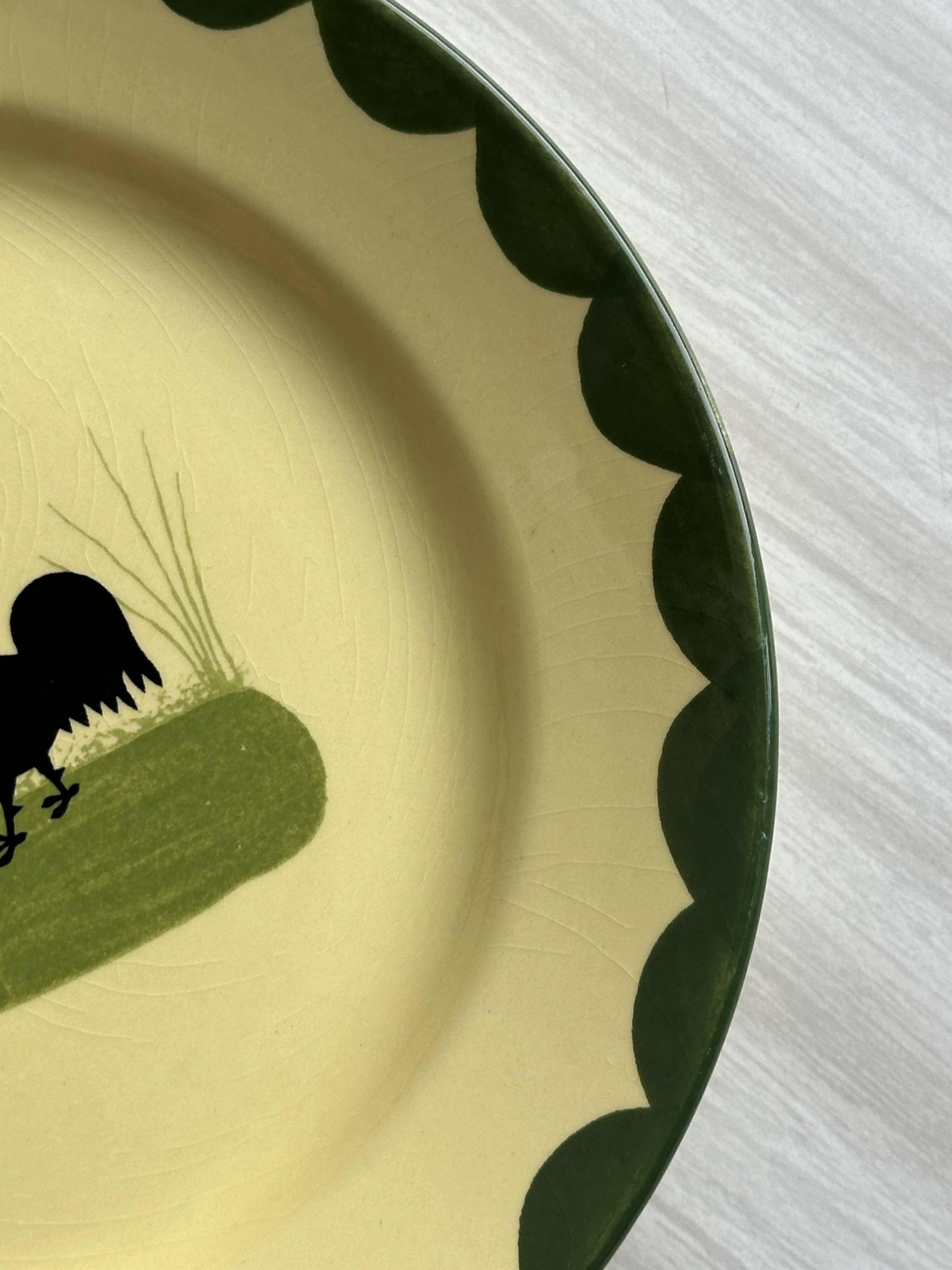 “Teller Keramik” ceramic plate with rooster motif.