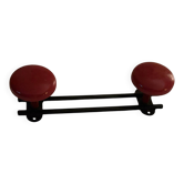 Double school coat hook. Garnet red metal.