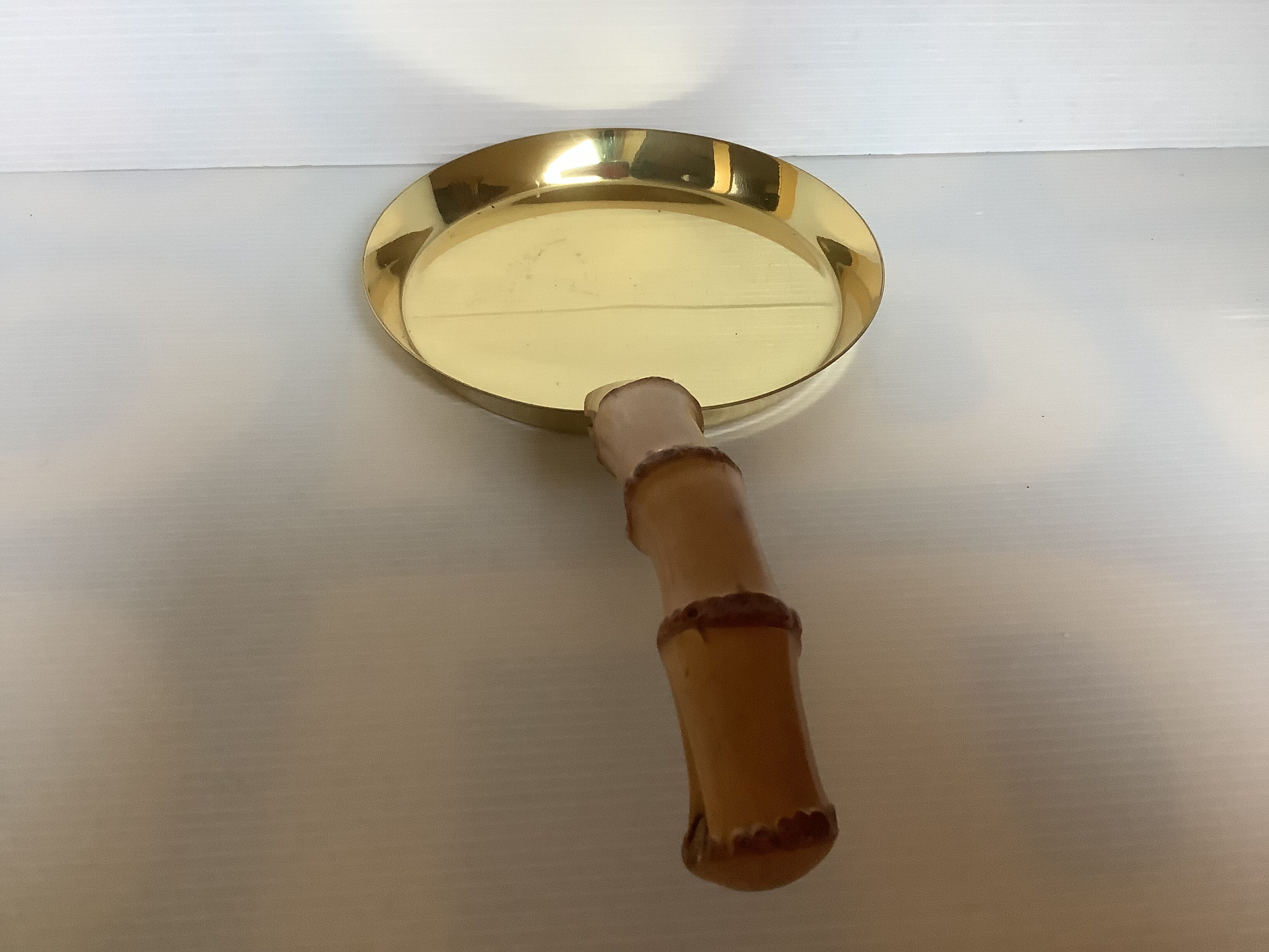 Grasoli Germany bamboo brass pocket emptier