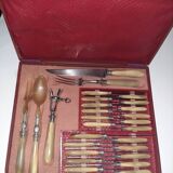 29-piece horn cutlery set, knives and serving utensils.
