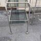 Pair of side tables design mm in chrome and glass