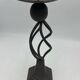 Antique metal candlestick.