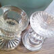 Duo of old glass candlesticks