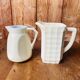 A pair of vintage ceramic jugs from the 1950s.