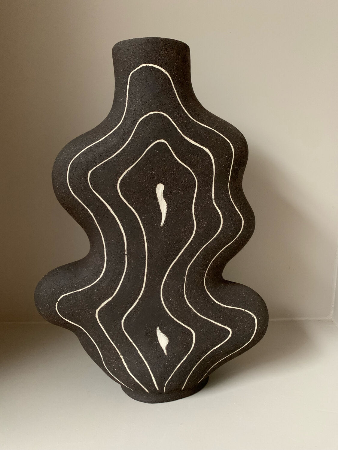 Raw black stoneware vase