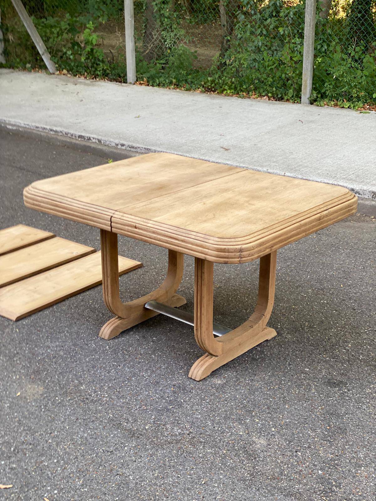 Art Deco dining table with a central pedestal, stripped in solid oak, with 2 extensions.