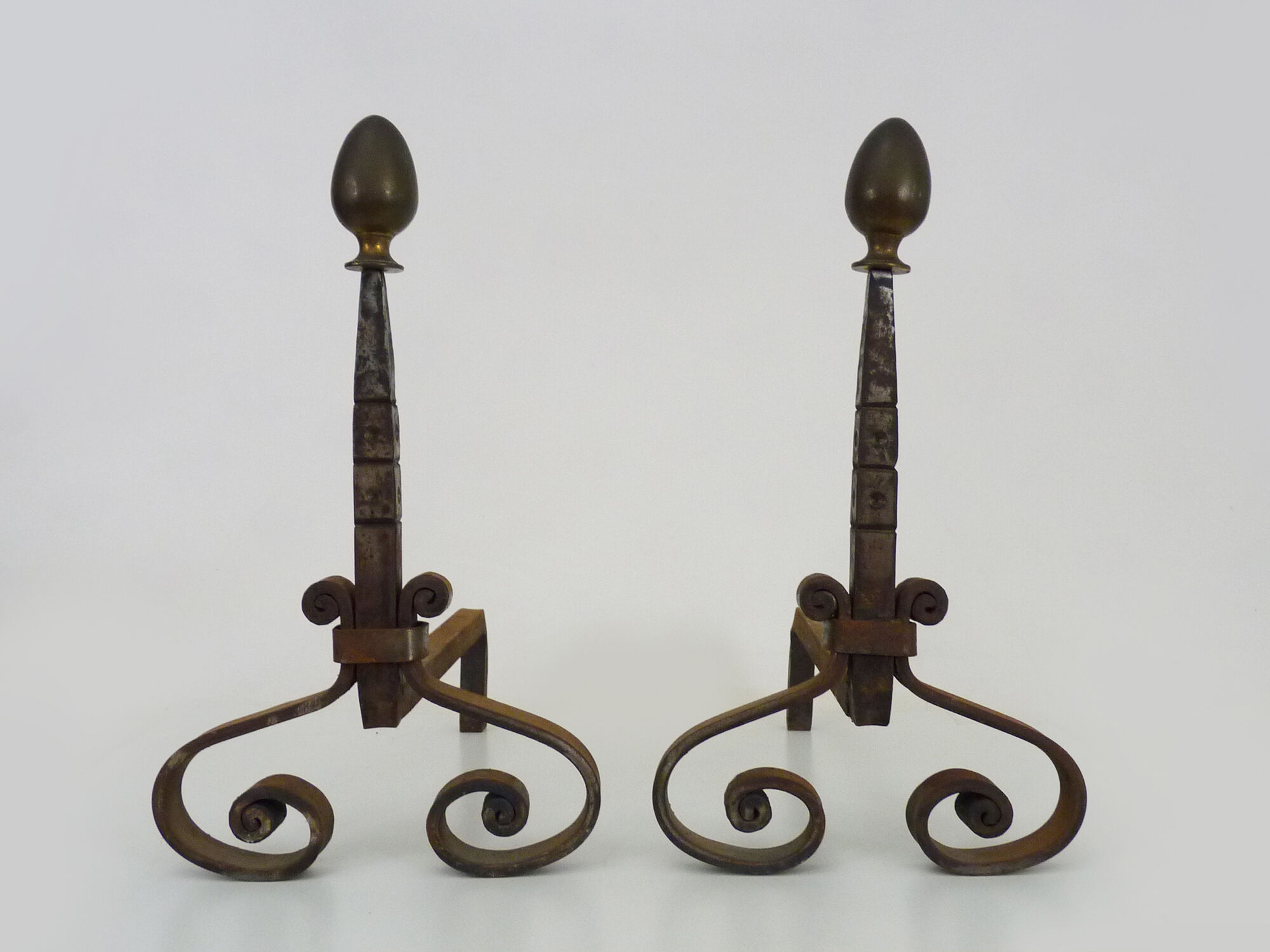 Pair of cast iron, wrought iron and brass chimney chenets. france 19th century