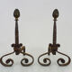 Pair of cast iron, wrought iron and brass chimney chenets. france 19th century