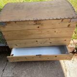 Raw wooden chest with a secret drawer
