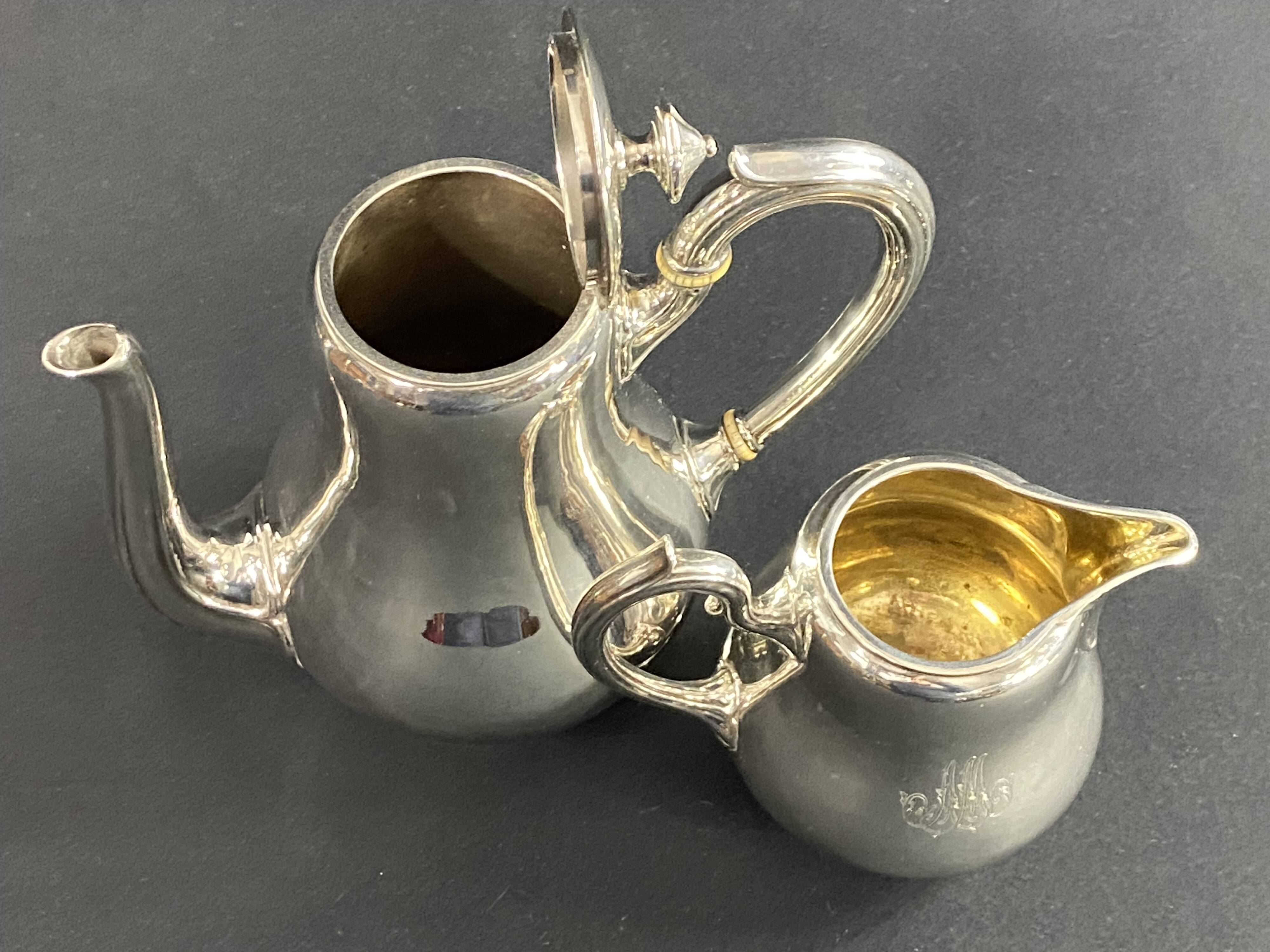 Silver-plated coffee pot and milk jug monogrammed MA, signed CHRISTOFLE.