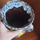 double-handled flame pot