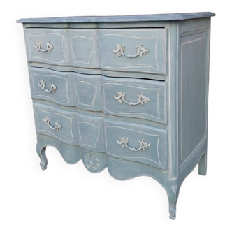 patinated curved chest of drawers