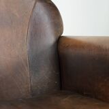 Armchair / lounge chair made of sheepskin leather with characterful patina