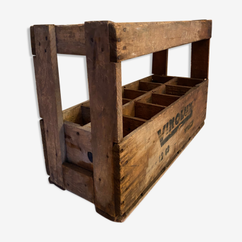 Wooden box with bottles