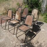 Set of 6 indu chairs in metal and exotic wood.