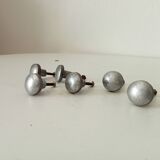 Pair of antique solid aluminium furniture handles.
