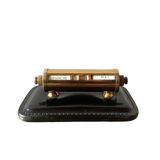 Old perpetual calendar in leather and brass