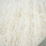 Round Belgian travertine dining table