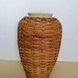 Rattan vase on ceramic